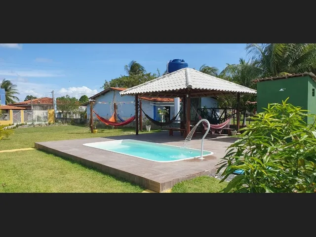 Imagem 4: Casa de Praia com Ar Campestre