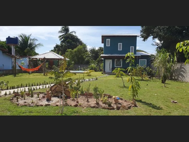 Imagem 6: Casa de Praia com Ar Campestre