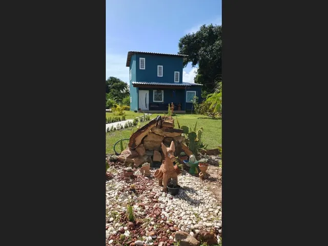 Imagem 2: Casa de Praia com Ar Campestre