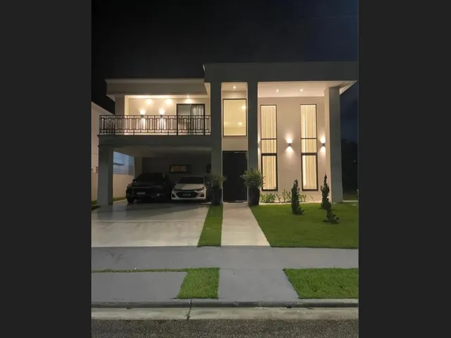 Imagem: A casa em condomínio possui 5 Dormitórios, 5 Suítes, 6