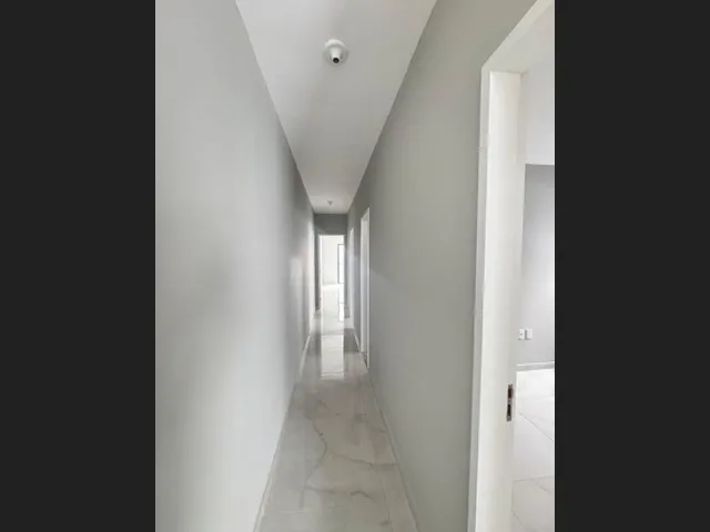 Imagem 8: Casa Plana Moderna com 3 Suítes, 3 Vagas de Garagem, Área Gourmet e Quintal na Sapiranga