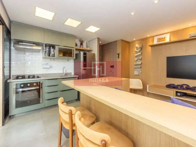 Imagem: O apartamento possui 2 Dormitórios, 1 Suíte, 2 Banheiros,