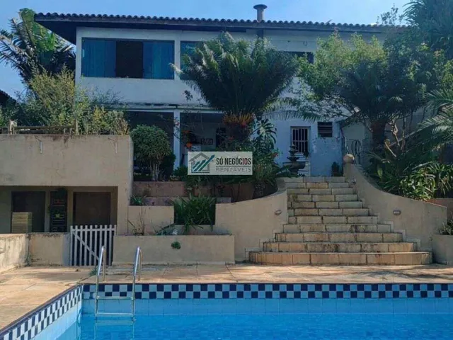 Imagem: A casa em condomínio possui 4 Dormitórios, 3 Suítes, 5