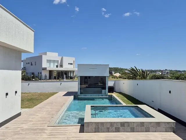 Imagem 4: Casa Linear no Jardins Veneza, 4 suítes, 398m², 3 vagas, lazer privativo