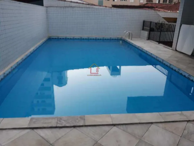 Imagem: O apartamento possui 2 Dormitórios, 1 Suíte, 2 Banheiros,