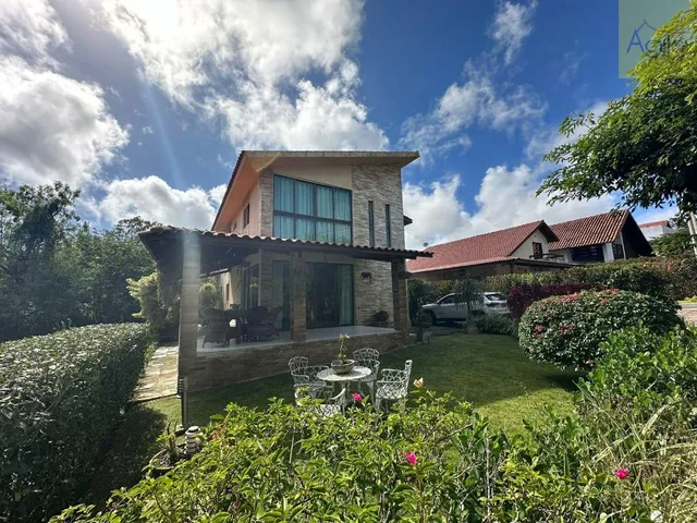 Imagem: A casa possui 5 Dormitórios, 5 Suítes, 6 Banheiros, 2 Vagas