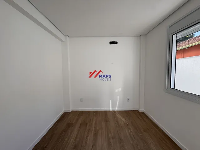 Imagem 4: Área privativa com três quartos, suíte e duas vagas de garagem à venda no bairro