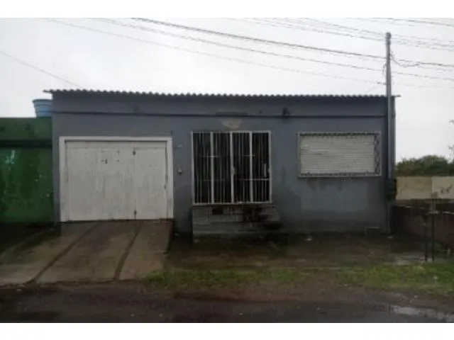 Imagem: A casa possui 3 Dormitórios, 3 Banheiros, 1 Vaga na
