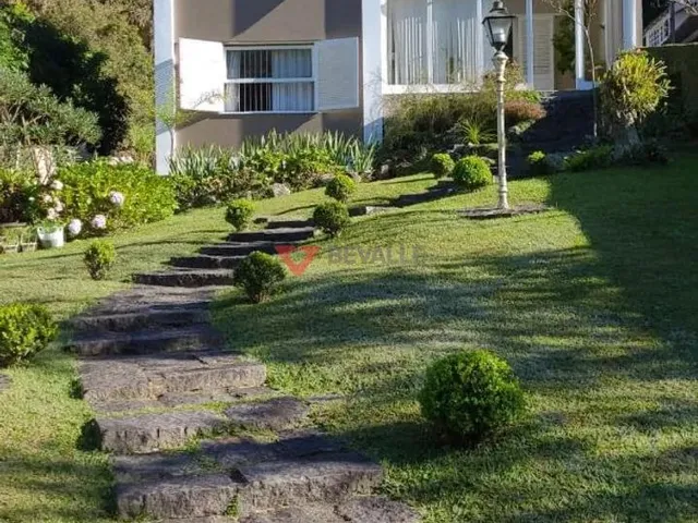 Imagem: A casa possui 5 Dormitórios, 4 Suítes, 4 Banheiros,
