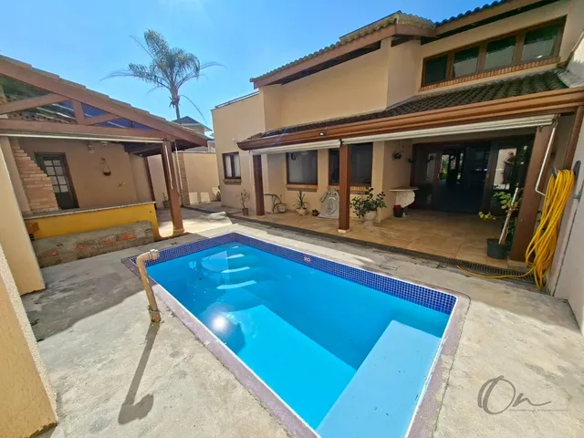 Imagem: Casa em Condomínio com 3 Suítes, Clube