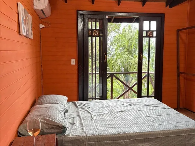 Imagem 13: Casa Exclusiva Inspirada em Bali À Beira da Lagoa 3 Suítes, Hidromassagem e Chalé Mobiliado