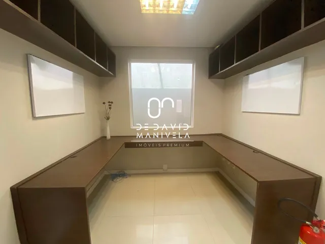Imagem 15: Casa comercial desocupada, semimobiliada, com 7 salas