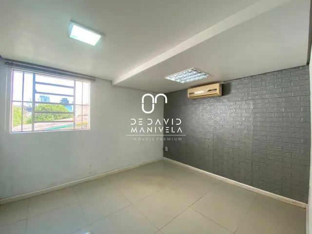 Imagem 14: Casa comercial desocupada, semimobiliada, com 7 salas