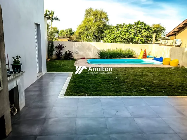 Imagem 8: Casa Tecnológica com Piscina Aquecida e Suíte na Vila Nova
