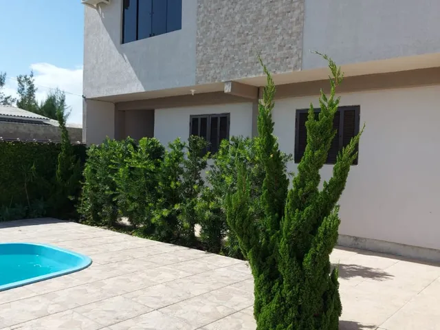 Imagem 8: Casa com piscina em Imbé