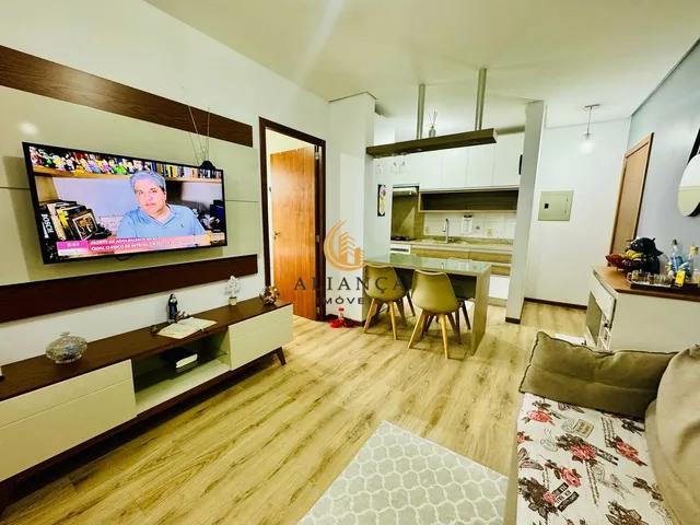 Imagem: O apartamento possui 2 Dormitórios, 1 Suíte, 1 Banheiro,