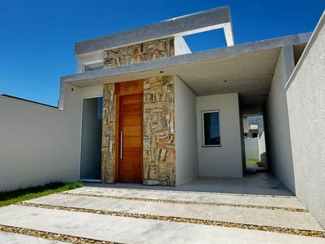 Imagem: A casa possui 3 Dormitórios, 1 Suíte, 2 Banheiros, 1 Vaga