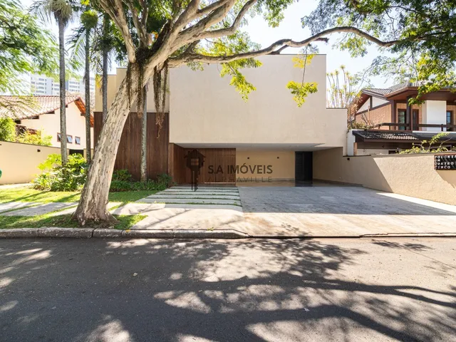 Imagem: A casa em condomínio possui 4 Dormitórios, 4 Suítes, 7