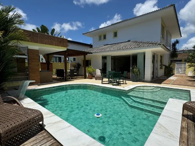Imagem: A casa em condomínio possui 4 Dormitórios, 3 Suítes, 4