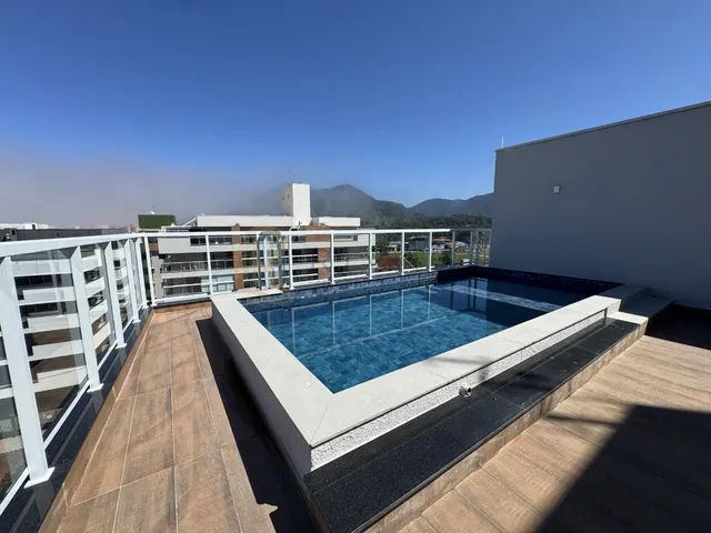 Imagem 2: Apartamento à Venda no Itaguá em Ubatuba com 2 Quartos, Sacada Gourmet e Piscina