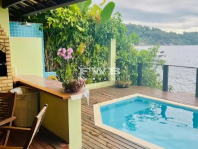 Imagem 11: Maravilhosa casa de condomínio frente mar em Angra dos Reis. Composta por 3 quartos