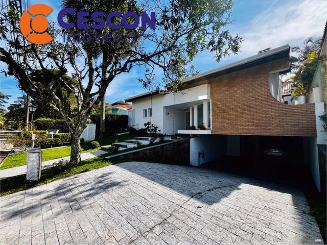 Imagem: A casa possui 4 Dormitórios, 3 Suítes, 5 Banheiros, 6
