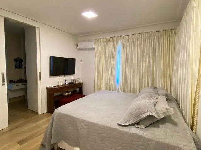 Imagem 9: Descubra a casa dos seus sonhos no bairro Renato Gonçalves! Essa luxuosa propriedade de