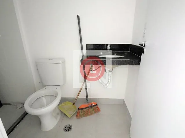 Imagem 4: Este encantador apartamento está localizado na desejada Vila Assunção, em Santo