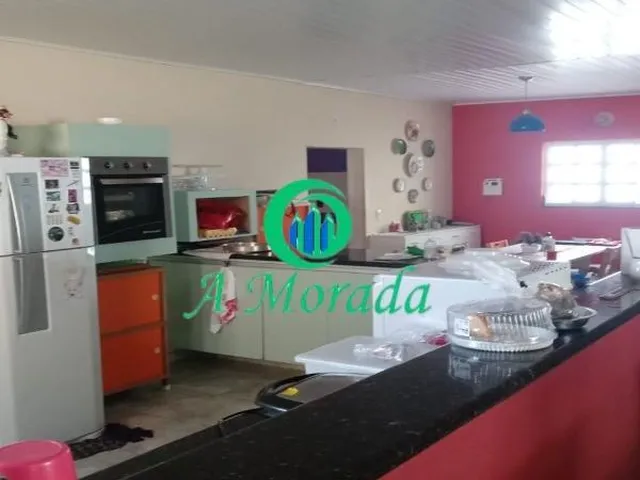 Imagem 2: Casa Térrea contendo 04 dormitórios, 02 salas, copa, cozinha, 03 banheiros, 01 lavabo