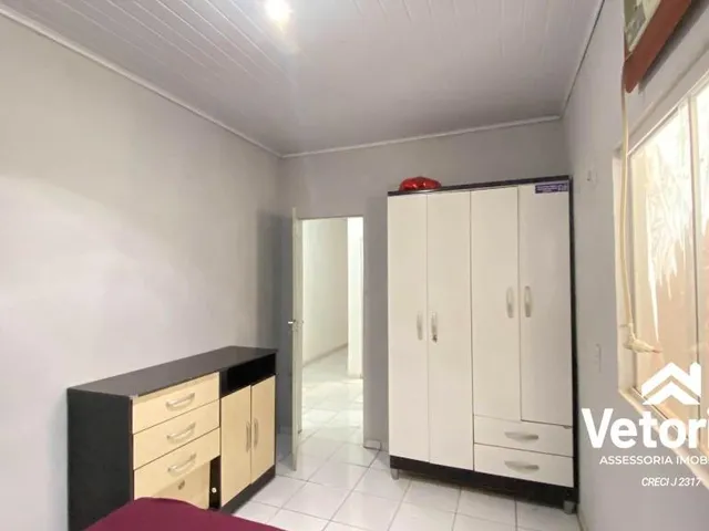Imagem 13: Seja bem-vindo! Localizada em um bairro tranquilo e arborizado, esta casa espaçosa e