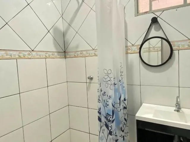 Imagem 15: Seja bem-vindo! Localizada em um bairro tranquilo e arborizado, esta casa espaçosa e