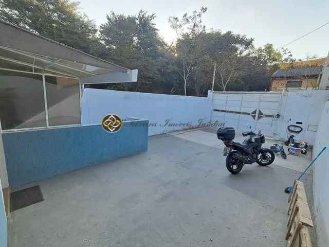 Imagem 5: Casa dos sonhos à venda! Localizada em uma rua tranquila e sem saída, esta