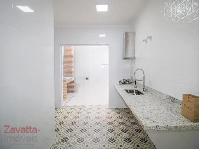 Imagem 12: Venha conferir essa incrível casa à venda! Com 4 quartos espaçosos, sendo 1 suíte, 2