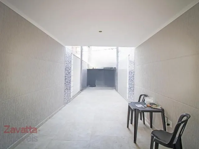 Imagem 8: Venha conferir essa incrível casa à venda! Com 4 quartos espaçosos, sendo 1 suíte, 2