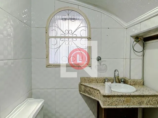 Imagem 7: Localizada na vibrante cidade de São Paulo, esta casa na Vila Clementino oferece uma