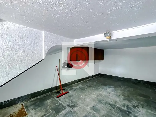 Imagem 11: Localizada na vibrante cidade de São Paulo, esta casa na Vila Clementino oferece uma