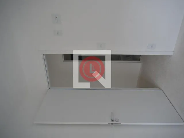 Imagem 5: Este encantador apartamento está localizado na desejada Vila Assunção, em Santo