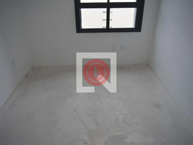 Imagem 2: Este encantador apartamento está localizado na desejada Vila Assunção, em Santo