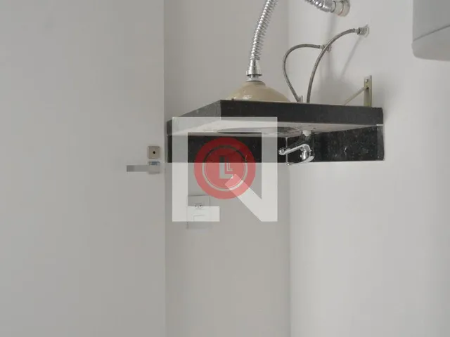 Imagem 7: Este encantador apartamento está localizado na desejada Vila Assunção, em Santo