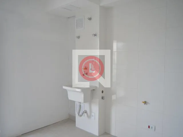 Imagem 8: Este encantador apartamento está localizado na desejada Vila Assunção, em Santo