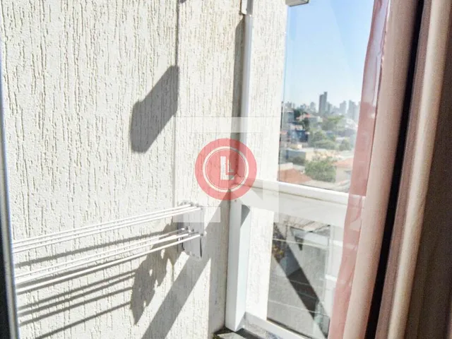 Imagem 2: Localizado no charmoso bairro da Vila Alice, este apartamento oferece uma combinação