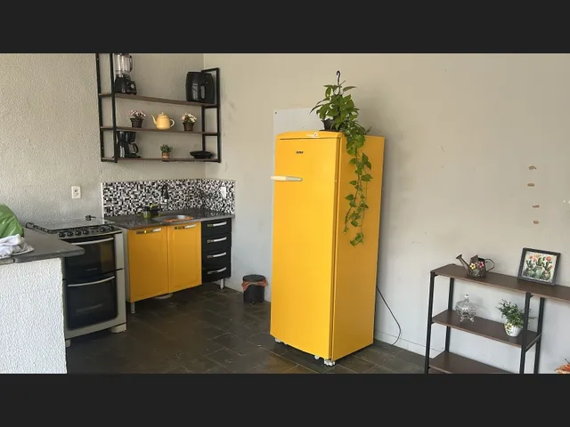 Imagem 2: Kitinet Amplo que Acomoda Tanto Familia Quanto Equipes de Trabalho