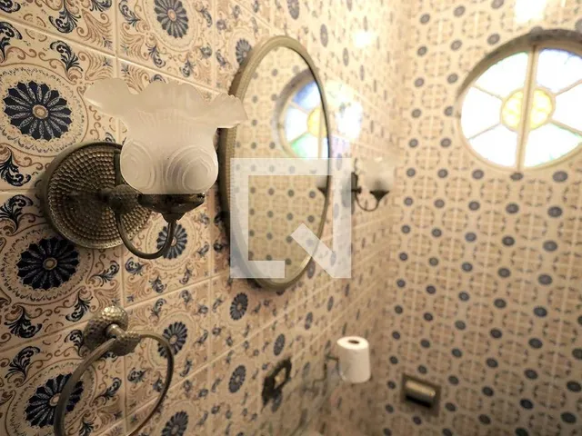 Imagem 7: Localizada em Santo André, esta espaçosa casa oferece um ambiente acolhedor e prático