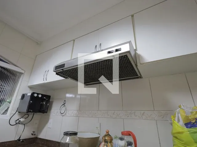 Imagem 13: Localizada em Santo André, esta espaçosa casa oferece um ambiente acolhedor e prático