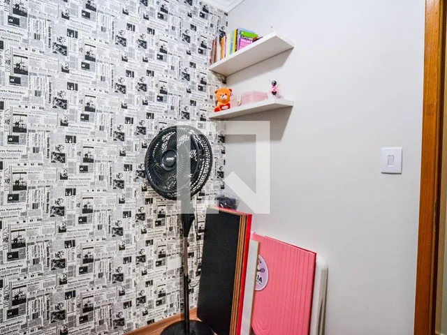 Imagem 14: Localizado no charmoso bairro da Vila Alice, este apartamento oferece uma combinação