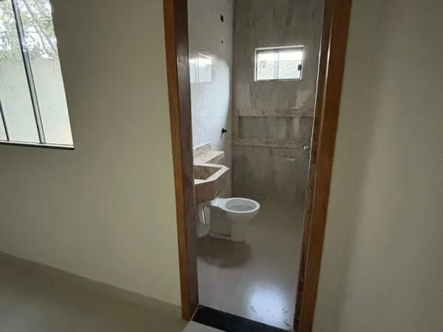 Imagem 2: Casa térrea à venda na Vila Fernanda, Campo Grande-MS, com suíte e 2 vagas