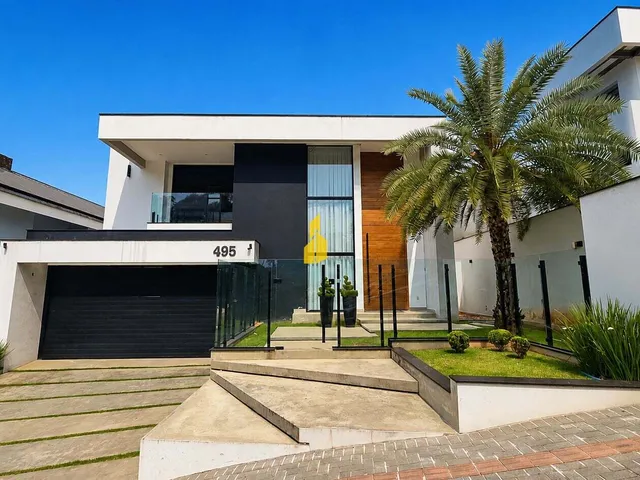 Imagem: Casa de alto padrão com 4 suítes, piscina