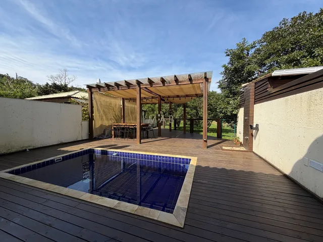 Imagem 8: Casa térrea com 2 dormitórios, sendo 1 suíte, piscina privativa, espaço gourmet e