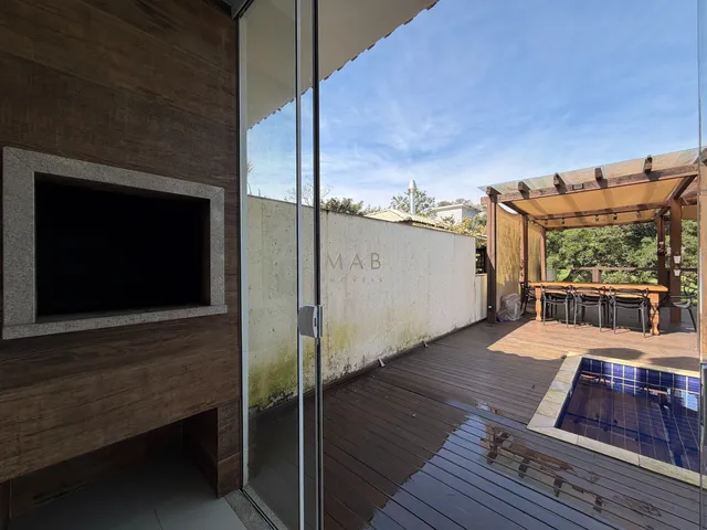 Imagem 12: Casa térrea com 2 dormitórios, sendo 1 suíte, piscina privativa, espaço gourmet e