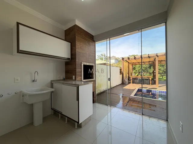 Imagem 16: Casa térrea com 2 dormitórios, sendo 1 suíte, piscina privativa, espaço gourmet e